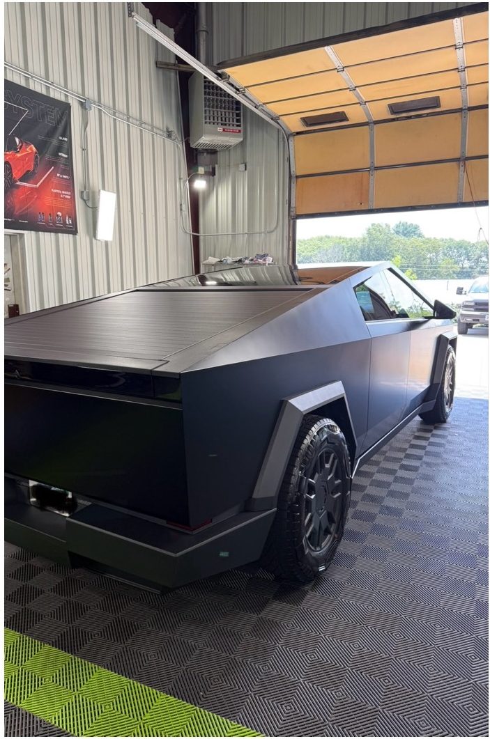 A Tesla Cybertruck finished in satin black.